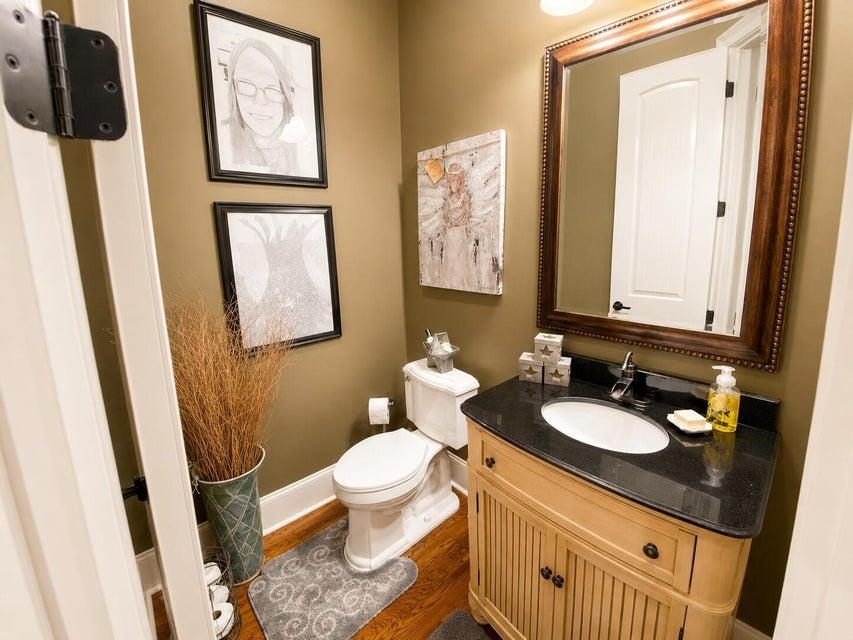 295 North Ridge Drive Saltillo, MS 38866 - Photo 24 of 38 a bathroom with a sink and a mirror