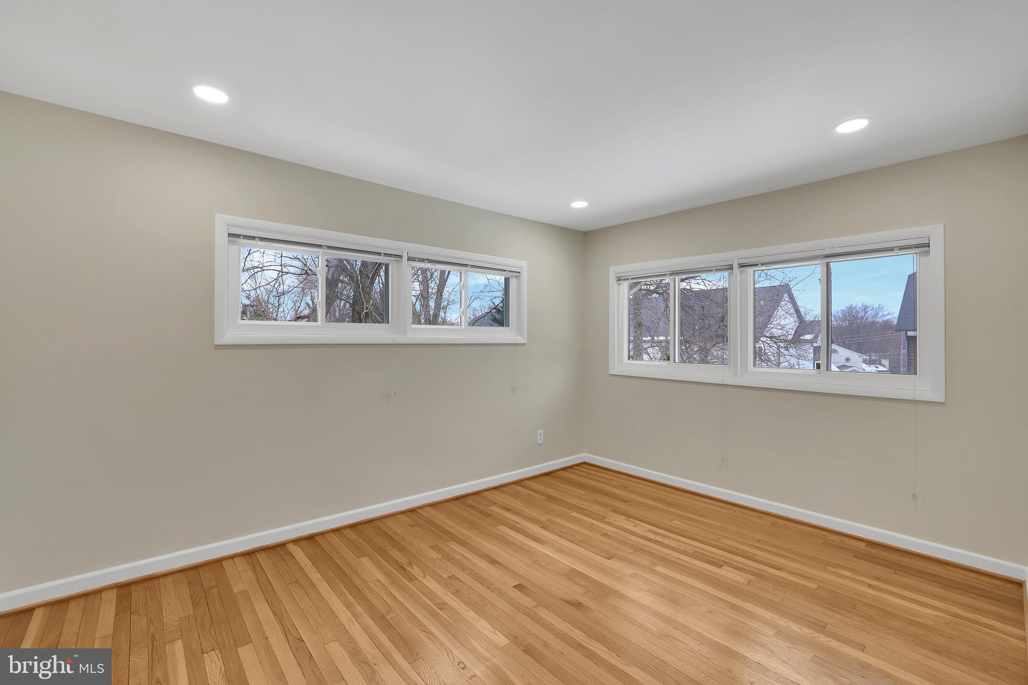 6718 Old Chesterbrook Road McLean, VA 22101 - Photo 2 of 49 a view of a room with wooden floor and a window