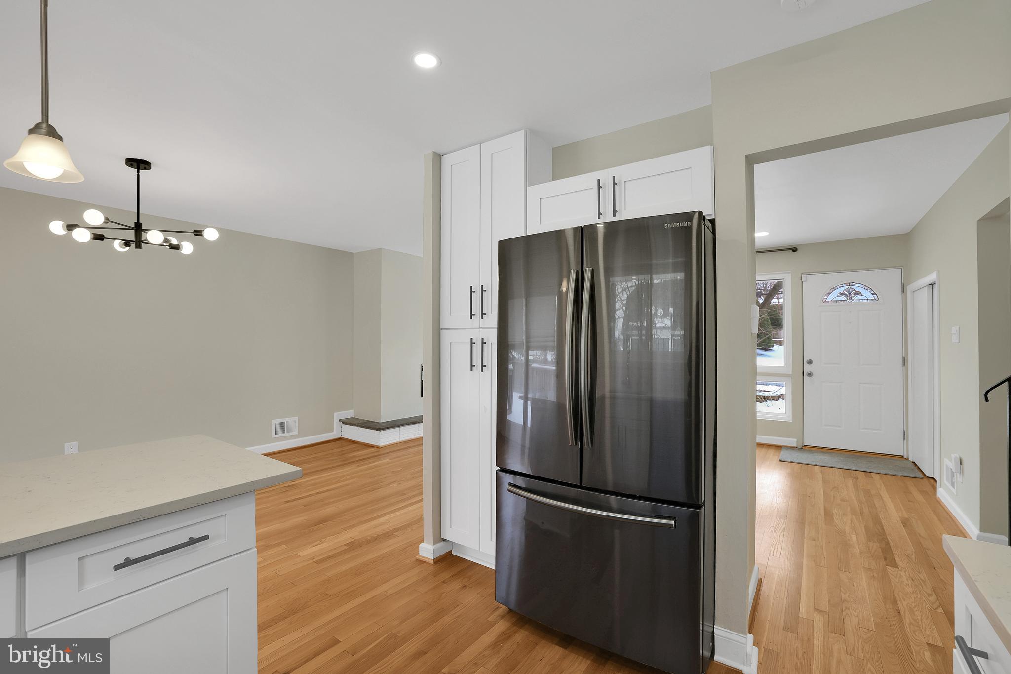 6718 Old Chesterbrook Road McLean, VA 22101 - Photo 22 of 49 a kitchen with granite countertop stainless steel appliances a refrigerator and cabinets