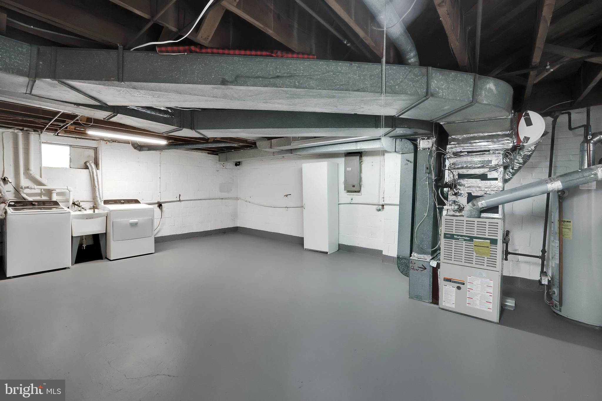 6718 Old Chesterbrook Road McLean, VA 22101 - Photo 42 of 49 a view of a room with racks on the wall