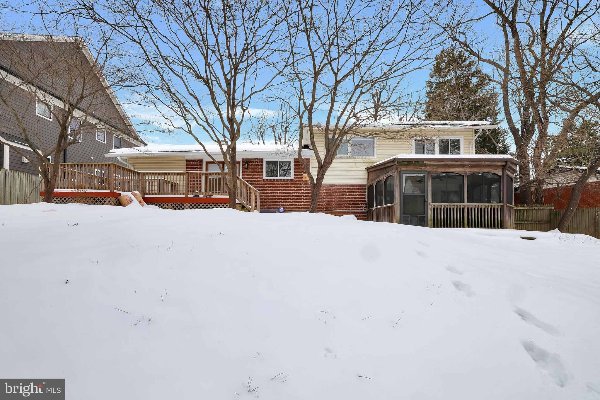 6718 Old Chesterbrook Road McLean, VA 22101 - Photo 46 of 49 a view of a building with snow on the road