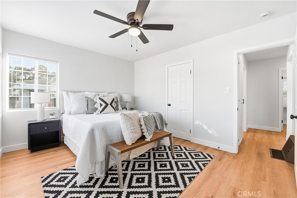 2835 Delta Avenue Long Beach, CA 90810 - Photo 13 of 29 a bedroom with a bed and a window