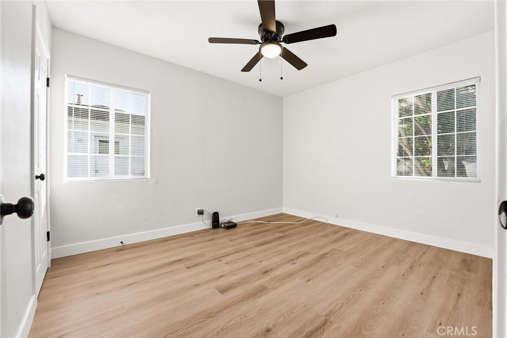 2835 Delta Avenue Long Beach, CA 90810 - Photo 16 of 29 wooden floor in an empty room with a window