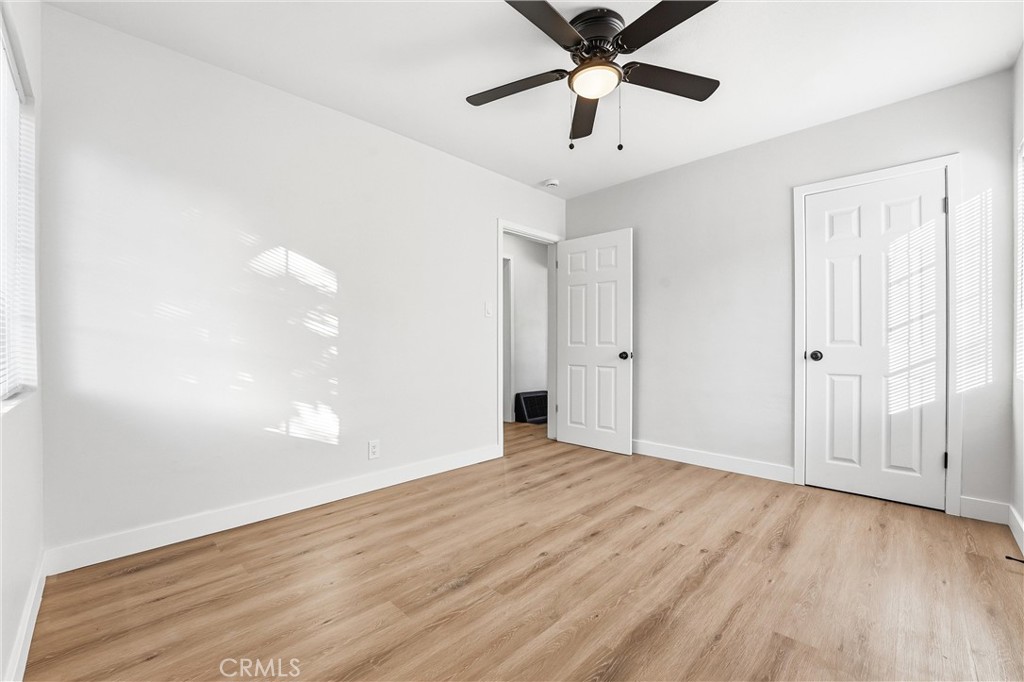 2835 Delta Avenue Long Beach, CA 90810 - Photo 17 of 29 a view of an empty room with wooden floor
