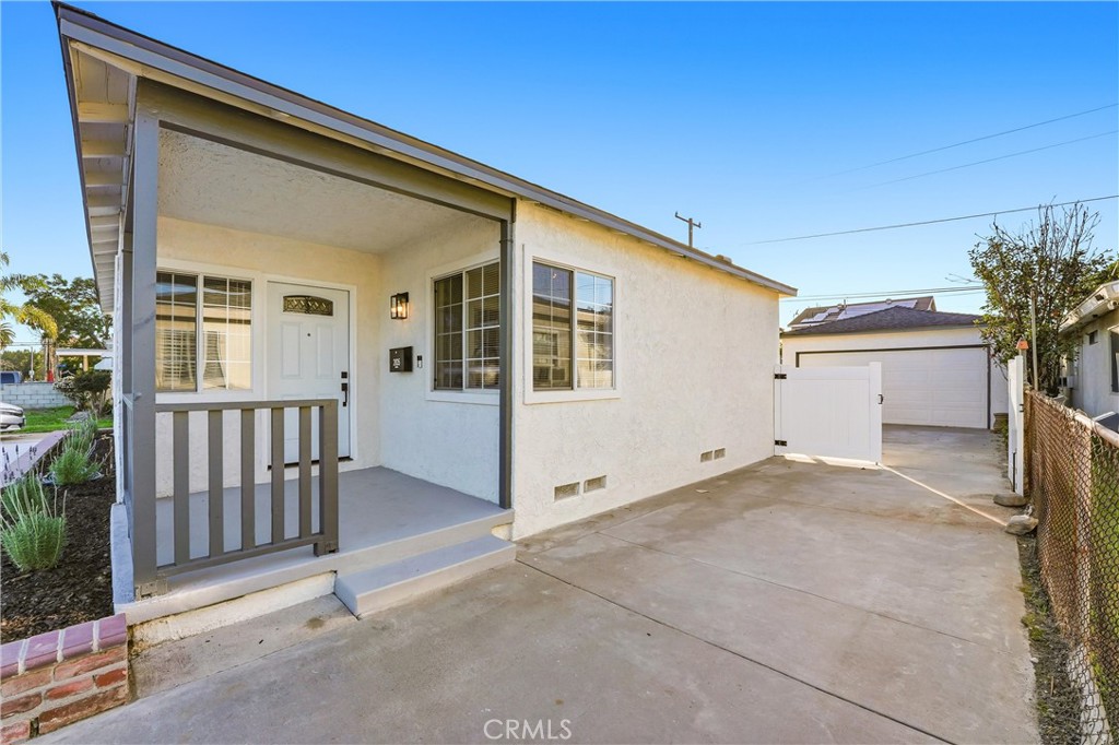 2835 Delta Avenue Long Beach, CA 90810 - Photo 3 of 29 a view of a house with a backyard