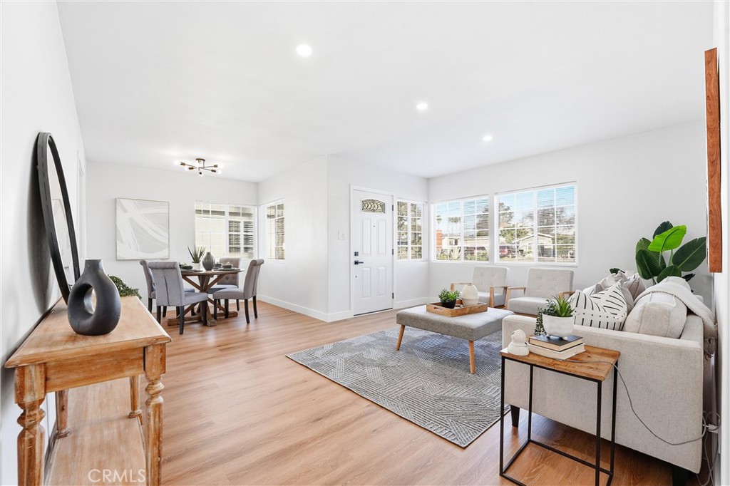 2835 Delta Avenue Long Beach, CA 90810 - Photo 4 of 29 a living room with furniture and wooden floor