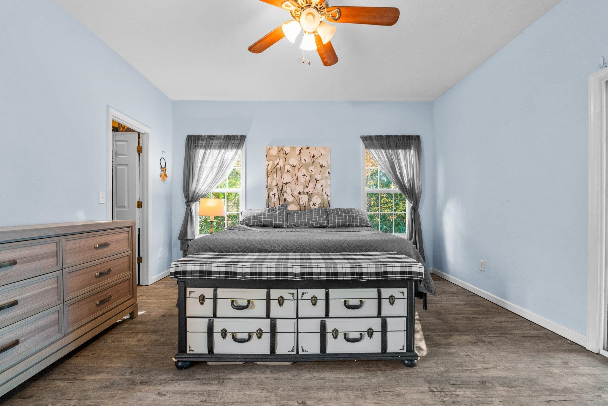 28 Commonwealth Court Cameron, NC 28326 - Photo 15 of 39 a bedroom with a bed and a dresser