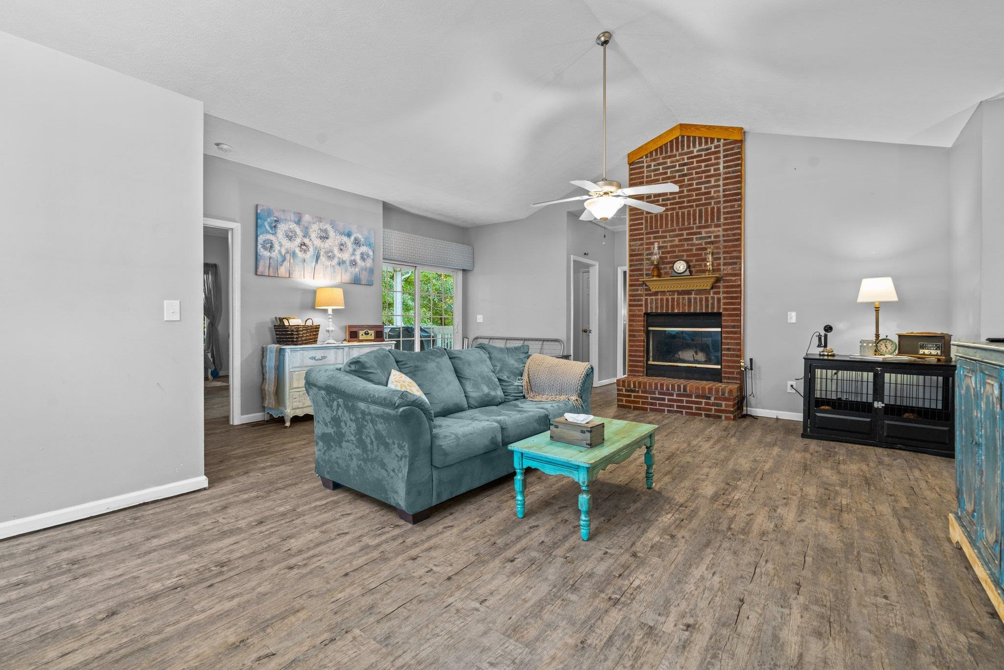 28 Commonwealth Court Cameron, NC 28326 - Photo 2 of 39 a living room with furniture and a fireplace