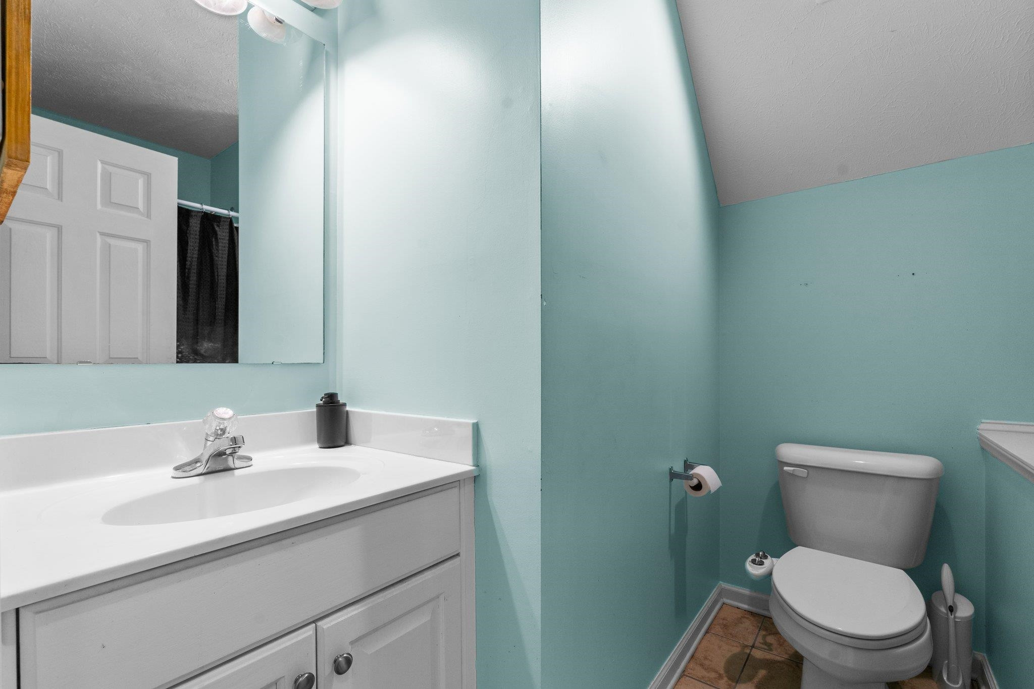 28 Commonwealth Court Cameron, NC 28326 - Photo 22 of 39 a bathroom with a sink toilet and mirror
