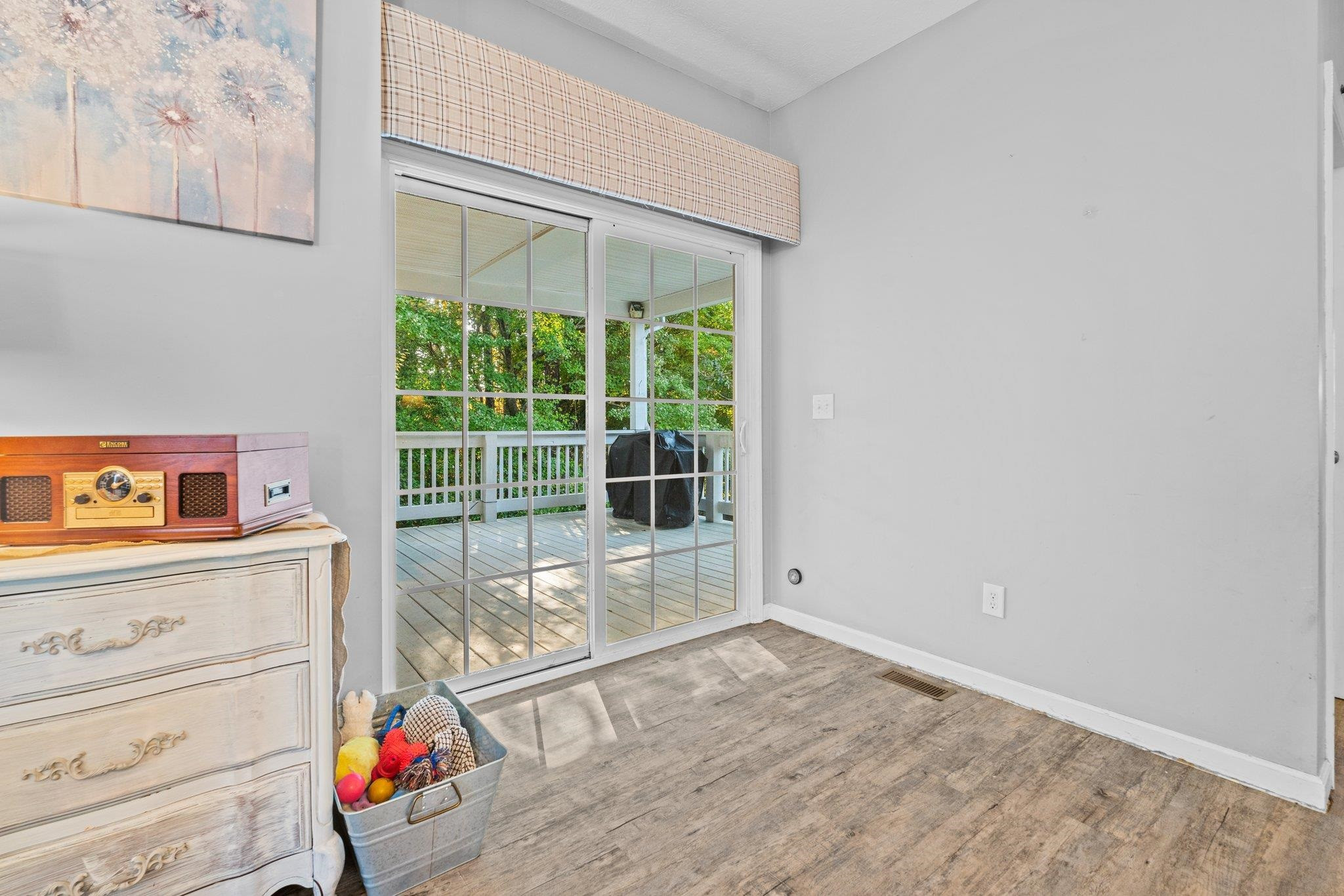 28 Commonwealth Court Cameron, NC 28326 - Photo 23 of 39 wooden floor in an empty room with a window