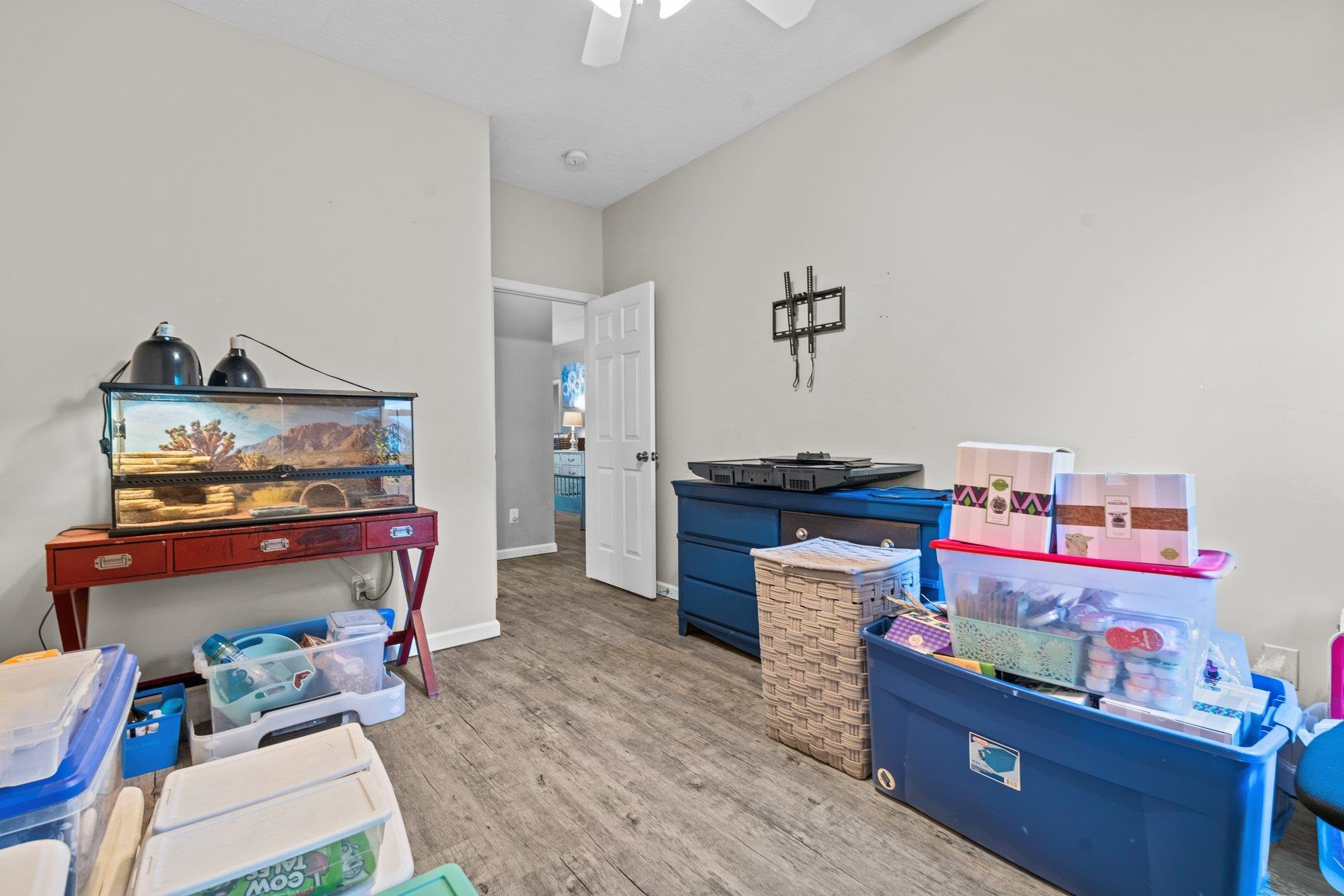28 Commonwealth Court Cameron, NC 28326 - Photo 28 of 39 a room with furniture and a wooden floor