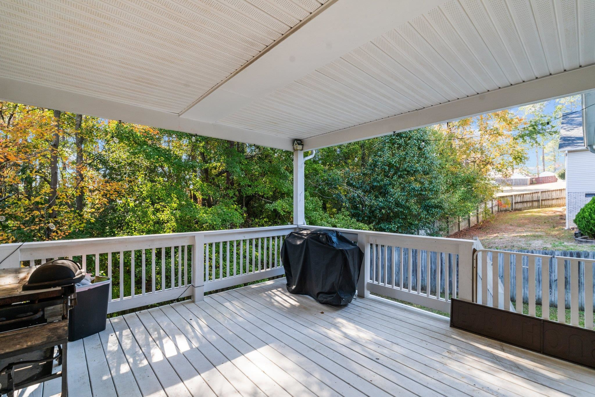 28 Commonwealth Court Cameron, NC 28326 - Photo 33 of 39 a view of balcony with wooden floor and fence