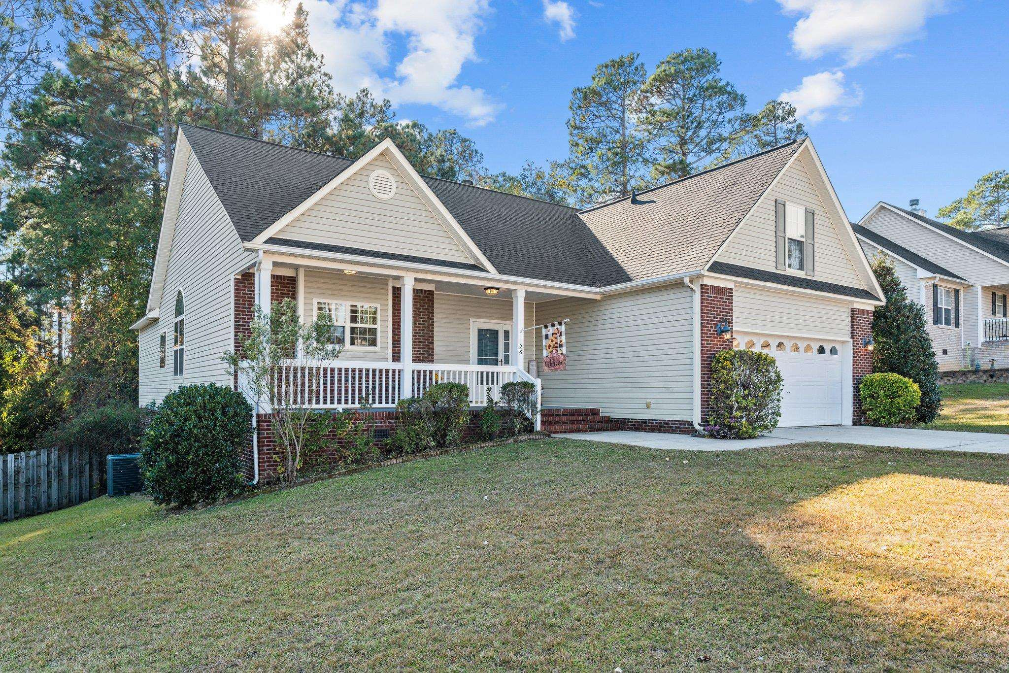28 Commonwealth Court Cameron, NC 28326 - Photo 37 of 39 front view of a house and a yard