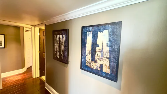 a bathroom with a double vanity sink toilet and shower