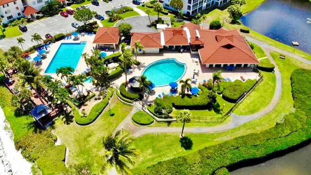 a view of a swimming pool with a garden