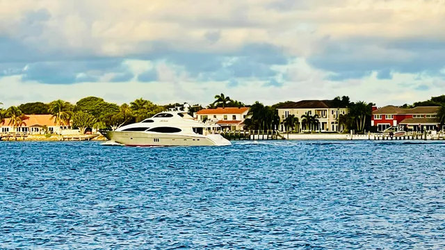 a view of swimming pool with a table and chairs