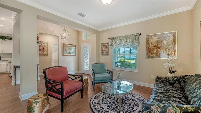 a living room with furniture and a window