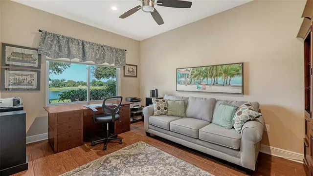 a living room with furniture and a rug