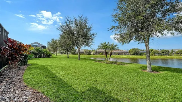 a view of swimming pool with outdoor space and river view
