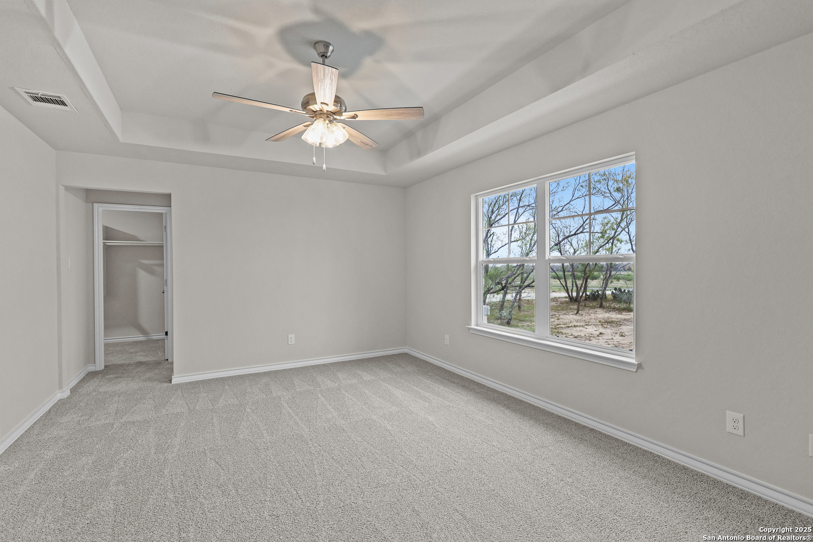 149 Sylas Hayes Loop Pleasanton, TX 78064 - Photo 18 of 38 a view of an empty room with a window