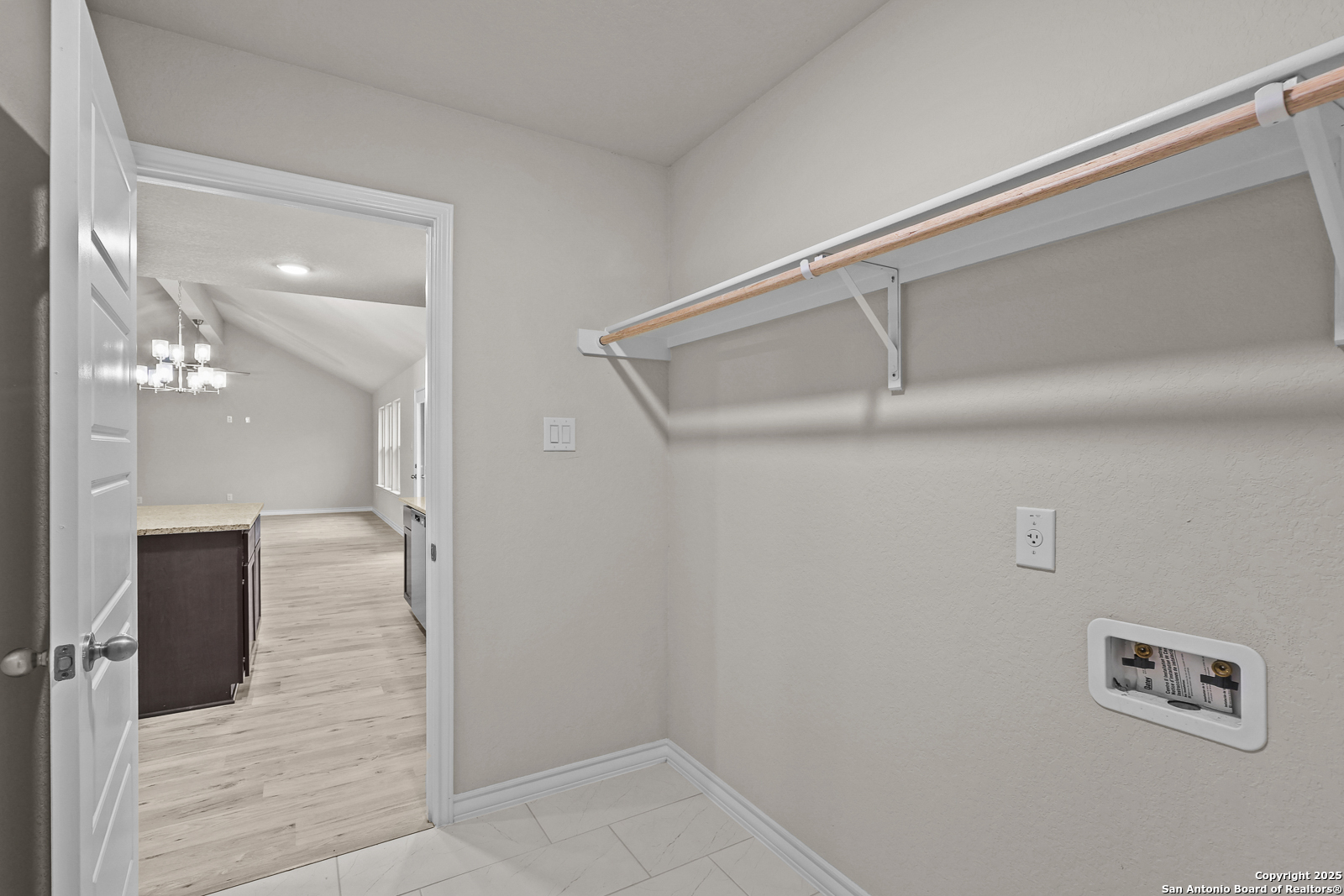 149 Sylas Hayes Loop Pleasanton, TX 78064 - Photo 28 of 38 a view of a hallway with closet