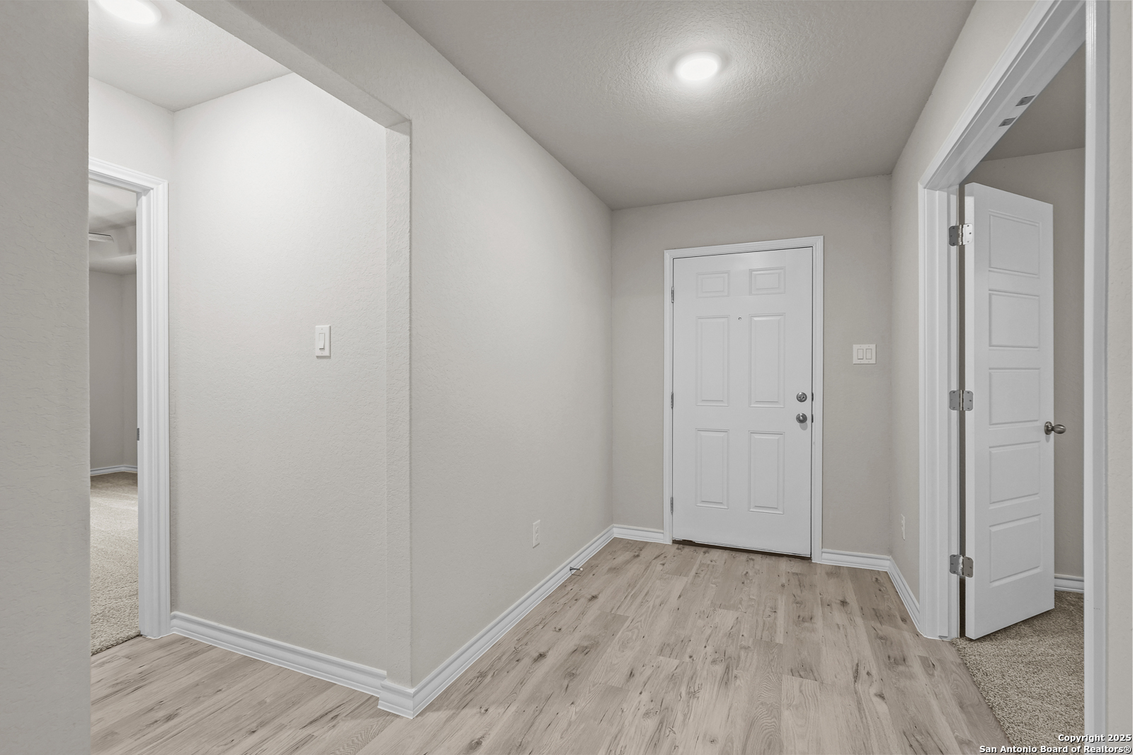 149 Sylas Hayes Loop Pleasanton, TX 78064 - Photo 6 of 38 wooden floor in an empty room
