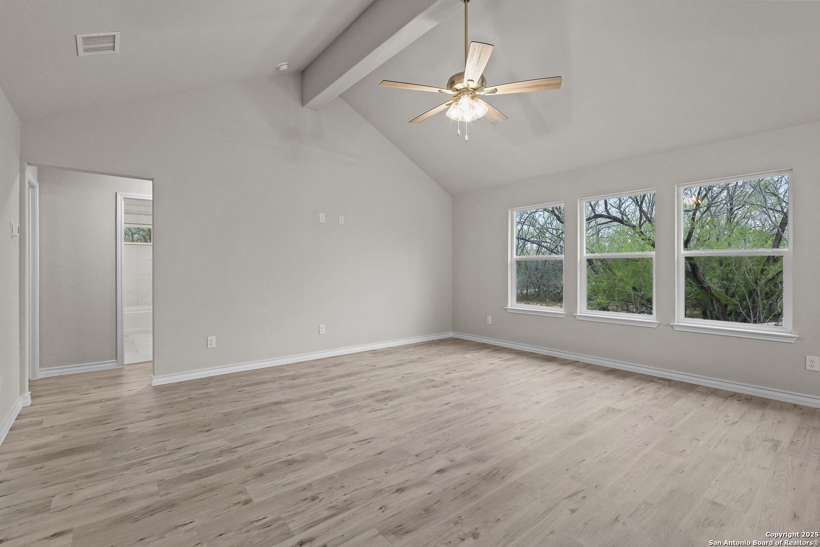 149 Sylas Hayes Loop Pleasanton, TX 78064 - Photo 9 of 38 a view of an empty room with a window