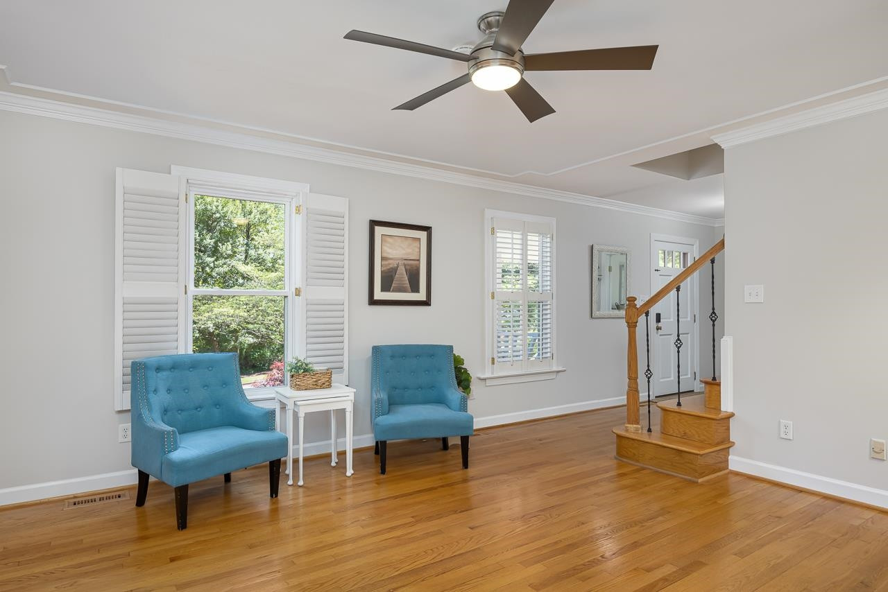 6345 Wynbrook Way Raleigh, NC 27612 - Photo 11 of 40 a living room with furniture and a window
