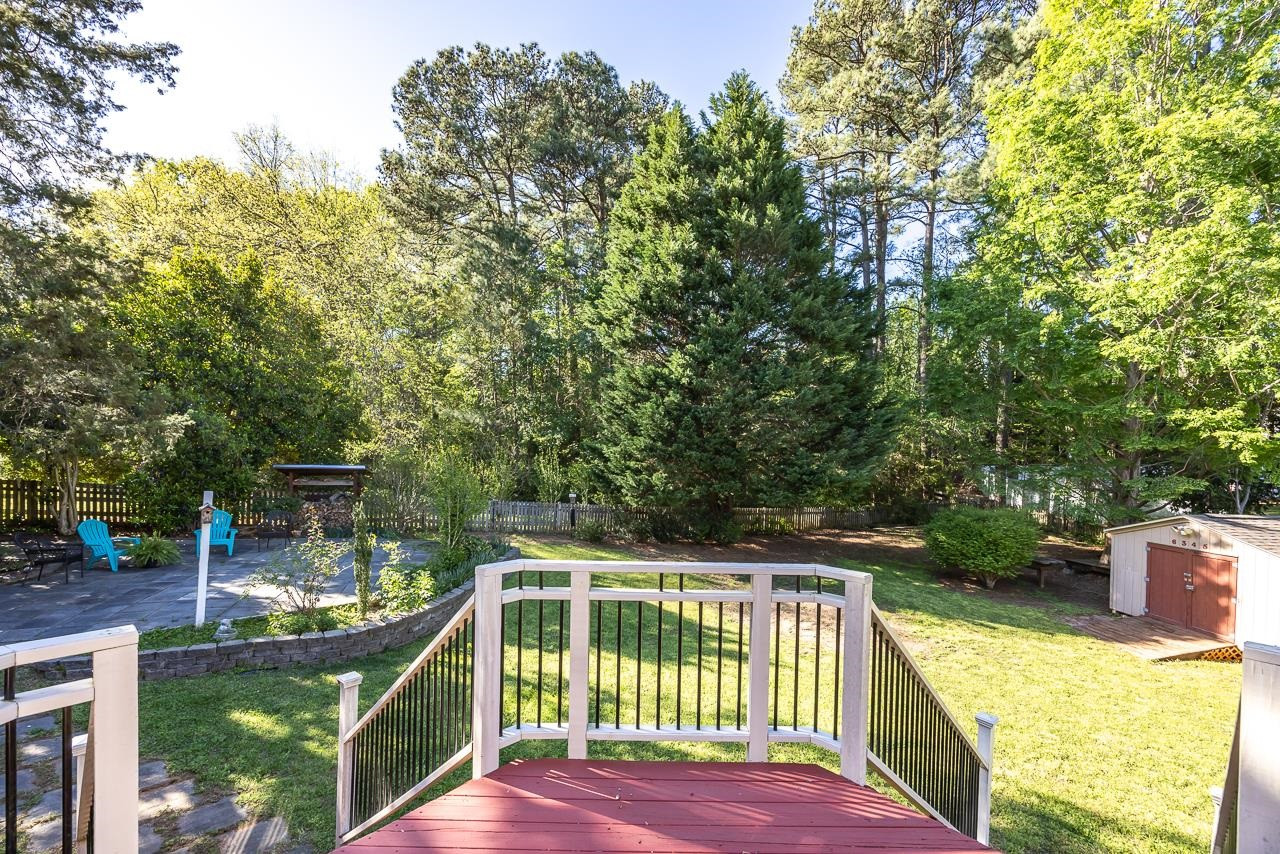 6345 Wynbrook Way Raleigh, NC 27612 - Photo 36 of 40 a view of a balcony with chairs