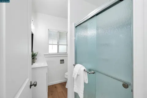 a bathroom with a bathtub and shower