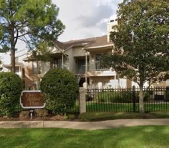 a view of backyard with green space