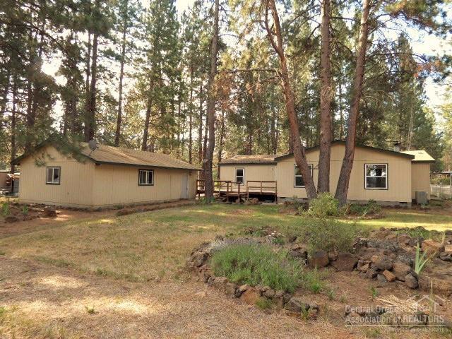 19176 Baker Road Bend, OR 97702 - Photo 18 of 25 a view of a house with a yard
