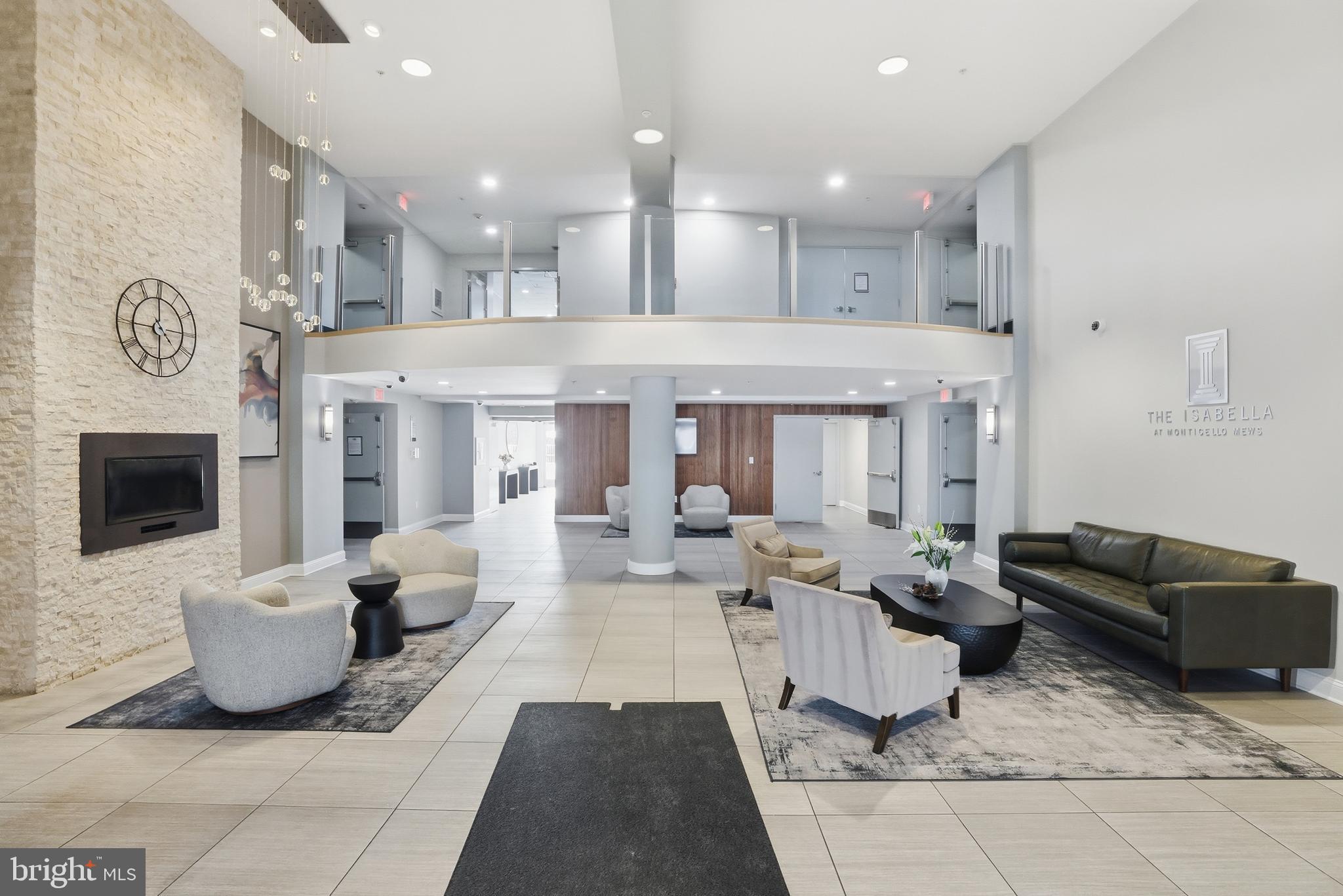 6301 Edsall Road, Unit 106 Alexandria, VA 22312 - Photo 14 of 28 a living room with furniture and a fireplace