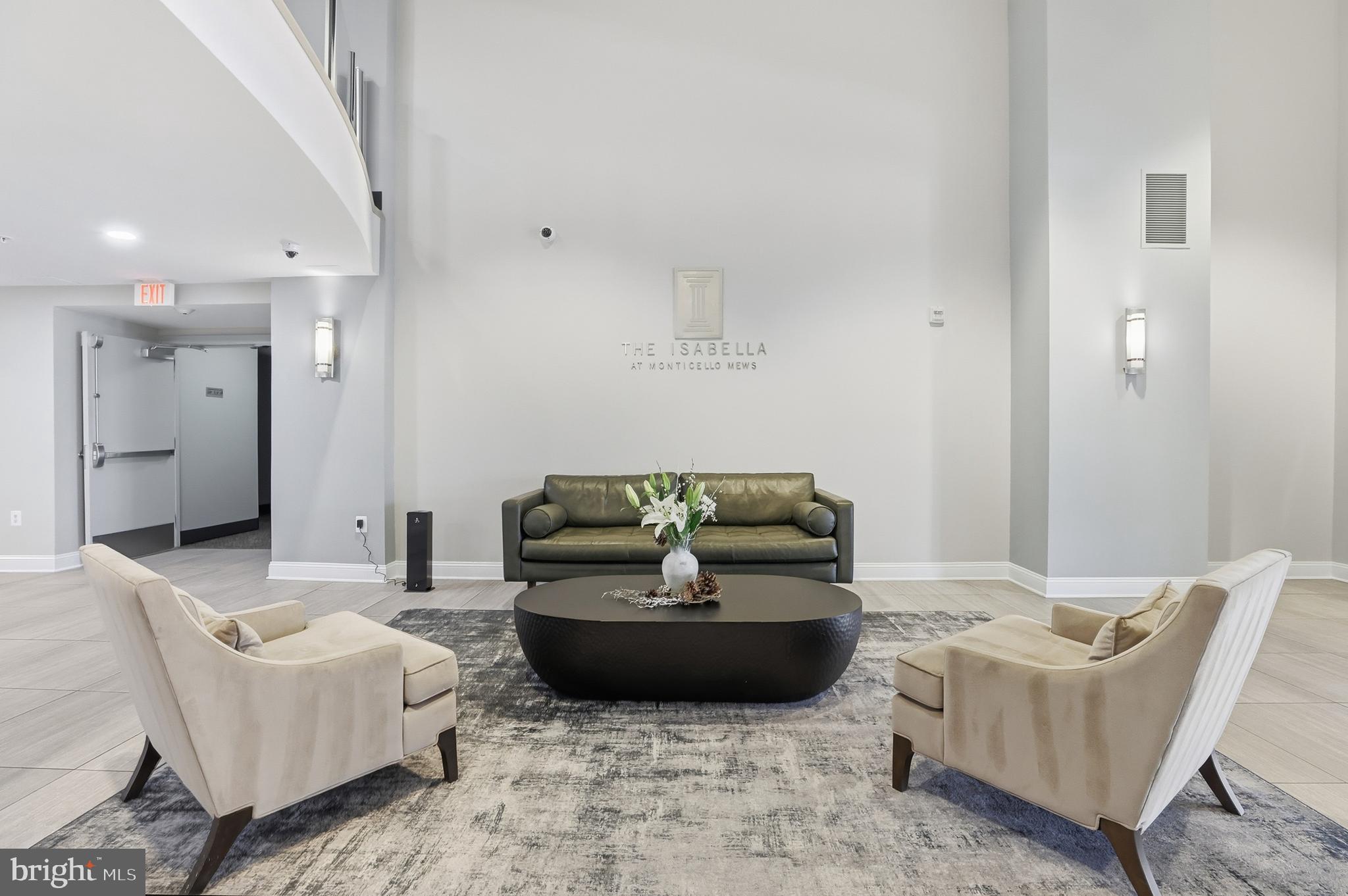 6301 Edsall Road, Unit 106 Alexandria, VA 22312 - Photo 15 of 28 a living room with furniture and a rug