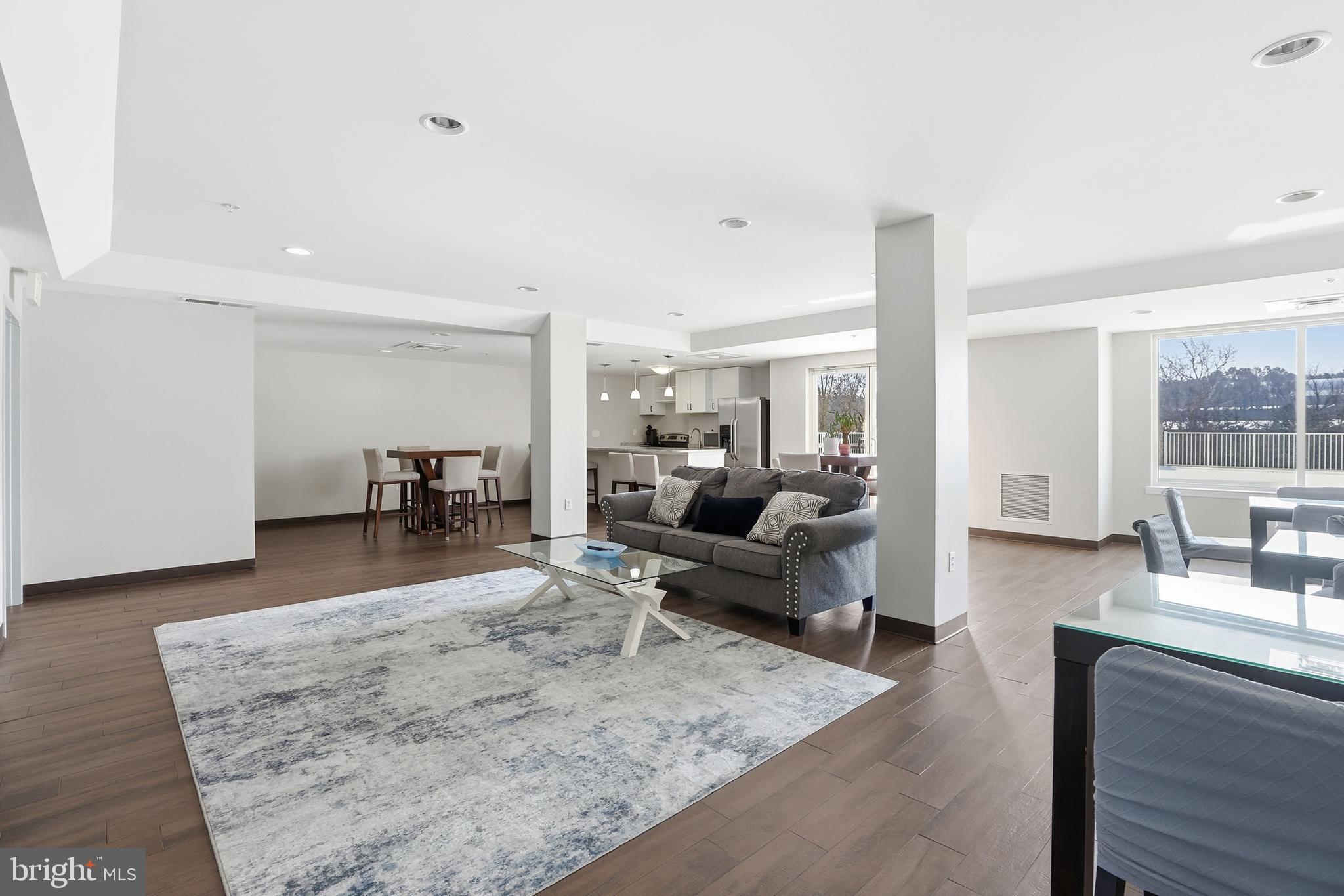 6301 Edsall Road, Unit 106 Alexandria, VA 22312 - Photo 21 of 28 a living room with furniture and a couch