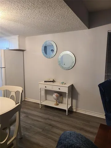 a room with a table and a clock