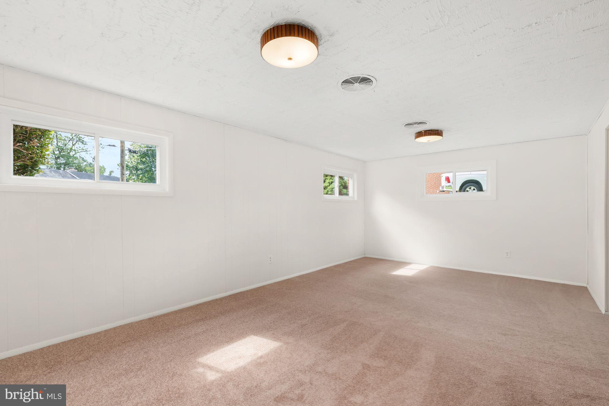 314 Burnt Mills Avenue Silver Spring, MD 20901 - Photo 22 of 29 Lower Level - Recreation Room