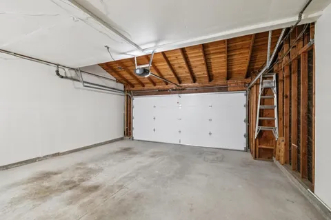 a porch with seating space and yard in the back