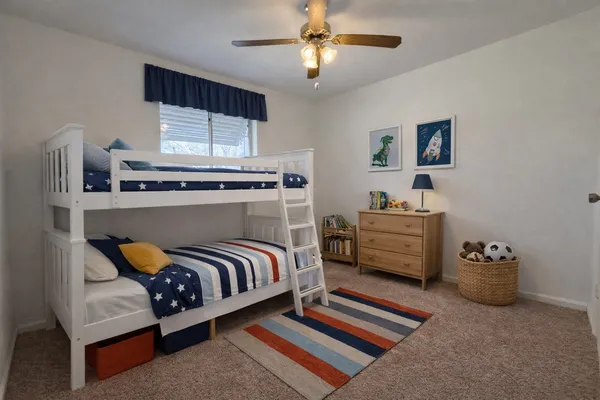 a bedroom with furniture and a chandelier
