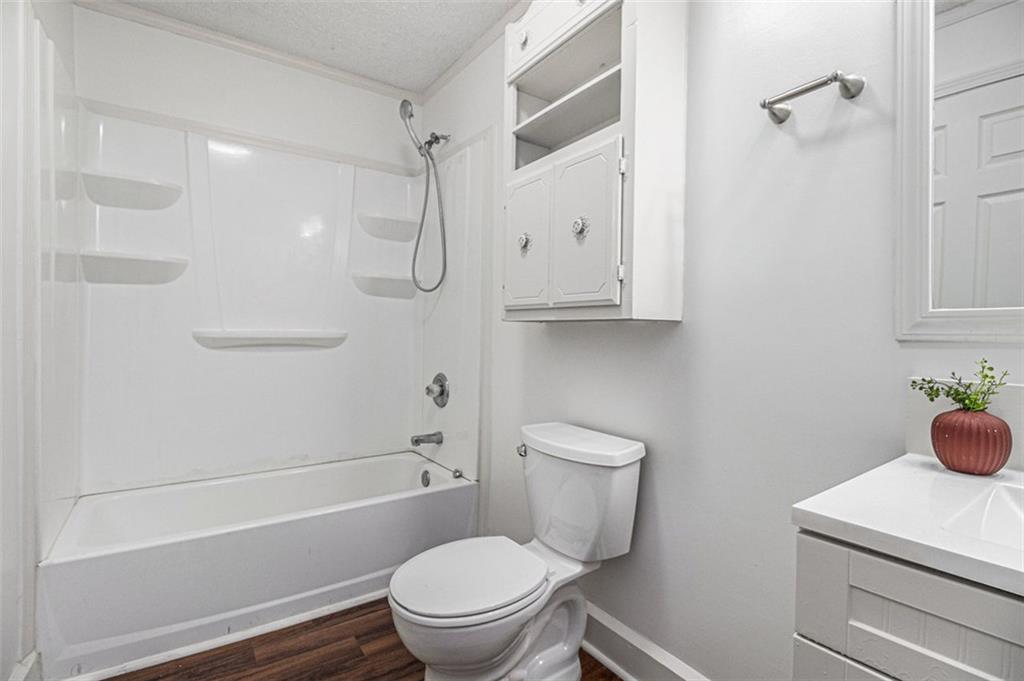 133 North Bellview Road Aragon, GA 30104 - Photo 17 of 22 a bathroom with a sink a toilet and shower