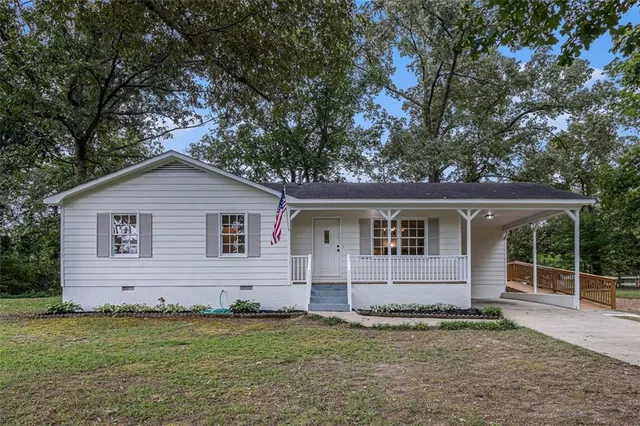 front view of a house with a yard