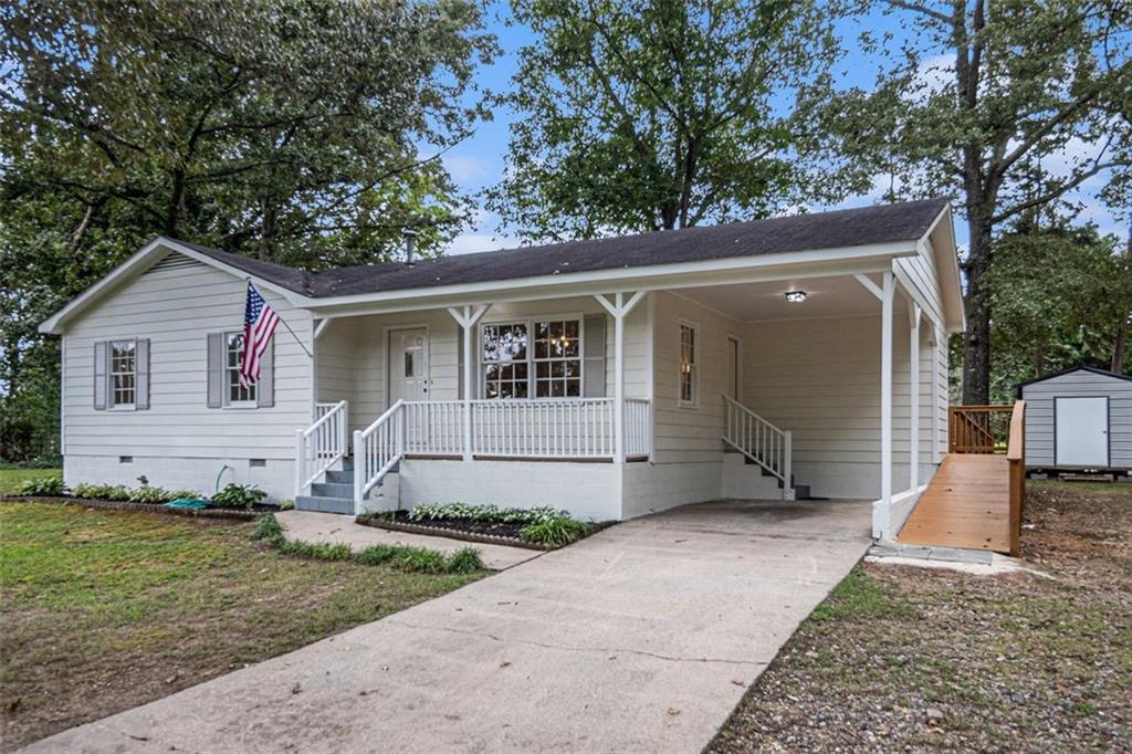 133 North Bellview Road Aragon, GA 30104 - Photo 4 of 22 a view of a house with a yard and large tree