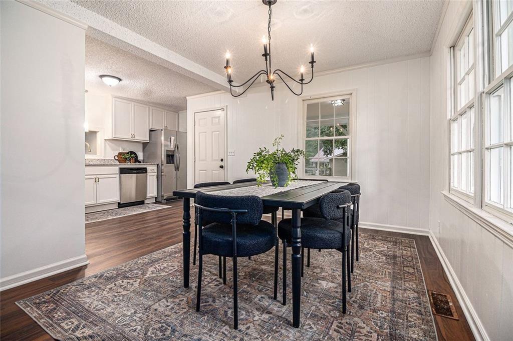 133 North Bellview Road Aragon, GA 30104 - Photo 6 of 22 a view of a dining room with furniture window and wooden floor