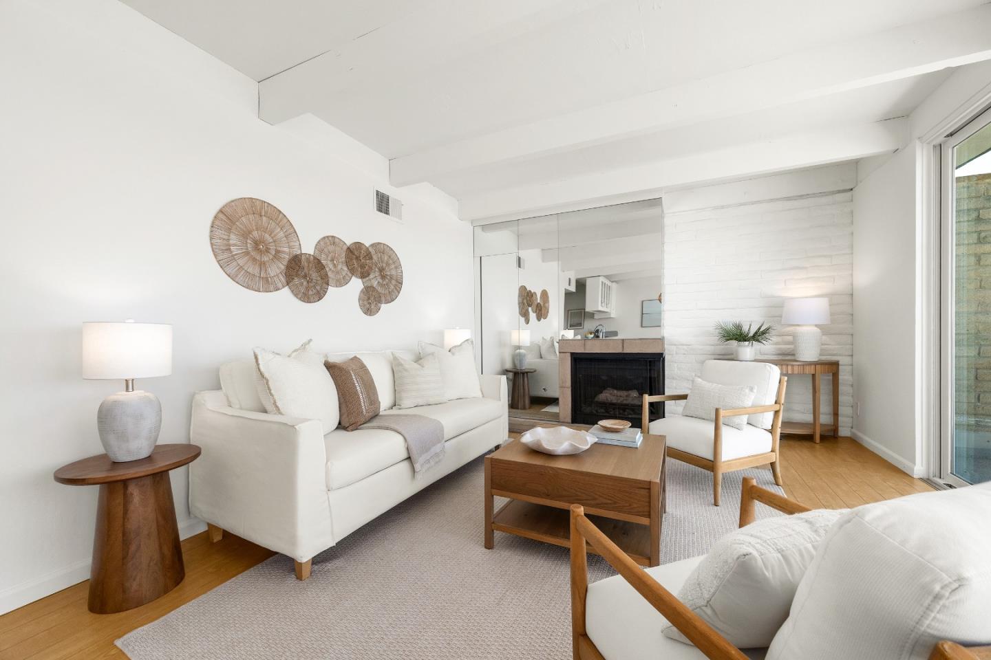 230 Rio Del Mar Boulevard, Unit K Aptos, CA 95003 - Photo 9 of 29 a living room with furniture a fireplace and a window