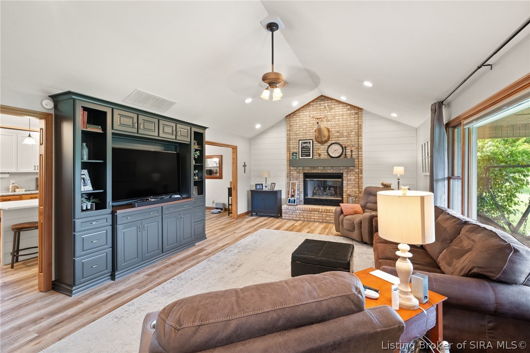 700 South 1233rd West Lexington, IN 47138 - Photo 5 of 65 Gorgeous and comfortable living room with vaulted ceiling, fireplace and built-ins!