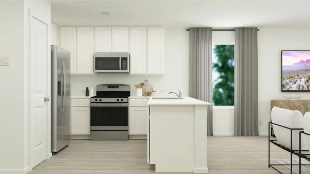 a kitchen with furniture cabinets and stainless steel appliances