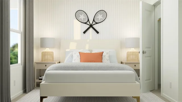 a bedroom with a bed and chandelier