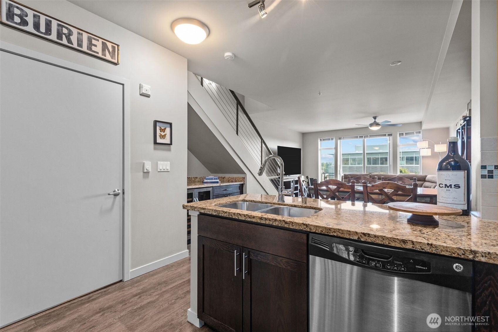 15100 6th Avenue Southwest, Unit 305 Burien, WA 98166 - Photo 16 of 40 a kitchen with sink and refrigerator