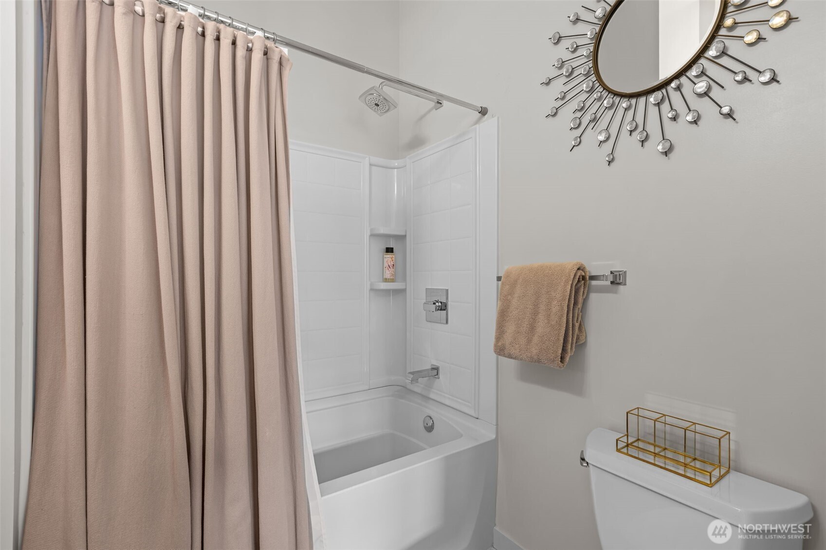 15100 6th Avenue Southwest, Unit 305 Burien, WA 98166 - Photo 27 of 40 a bathroom with a shower curtain and a curtain