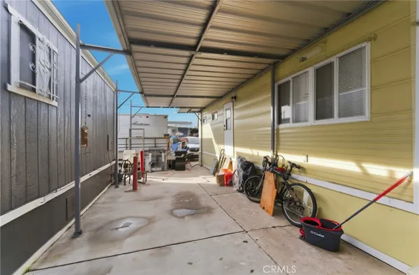 a kitchen with stainless steel appliances a refrigerator stove and sink